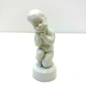 Royal Copenhagen Serene White Toothache Figurine